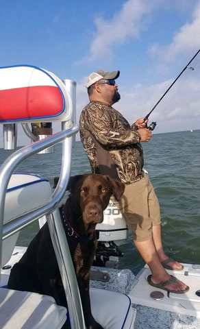 Mario and puppy fishing in Port Mansfield