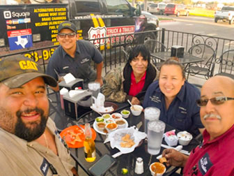 The US 281 Truck And Trailer Services LLC family dining at their Edinburg Workshop.